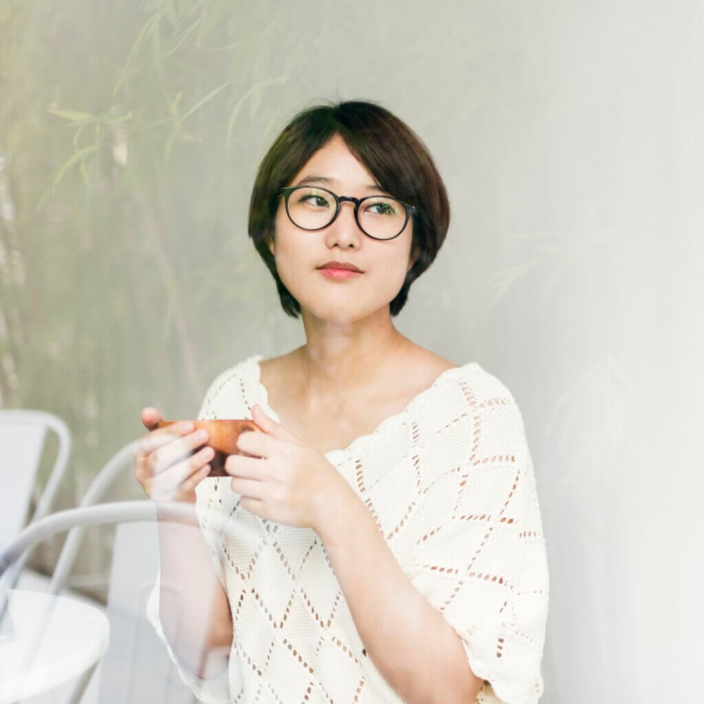 asian woman drinking tea relax concept.jpg